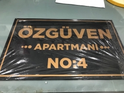 Özgüven apartmanı tabela